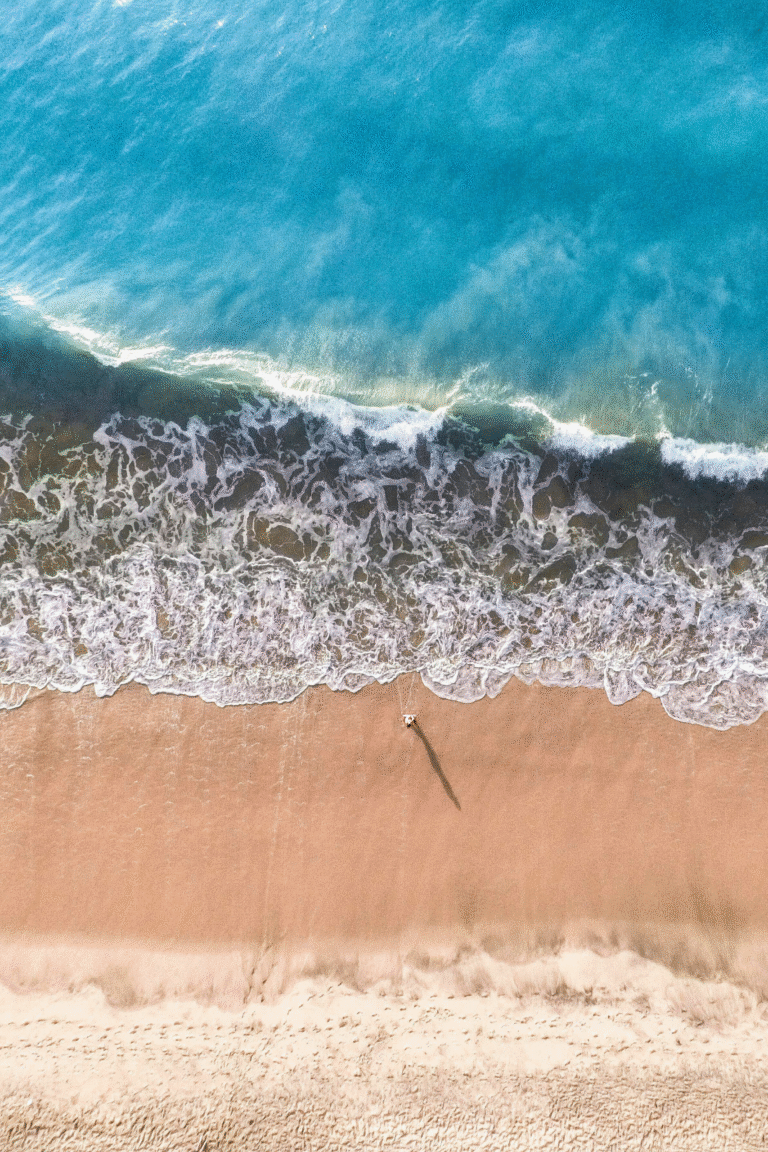Peaceful waves at Arugam Bay Beach on a sunny morning