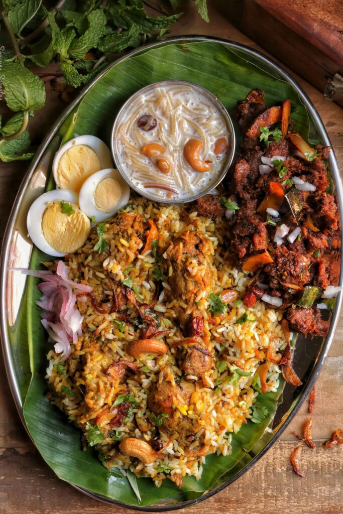 Closeup of lumprice meal with egg, meat, and sambol
